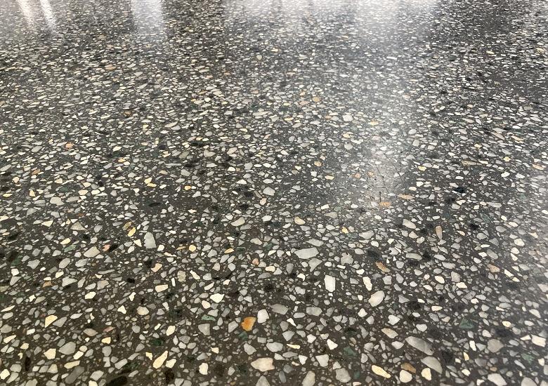 dark grey terrazzo flooring